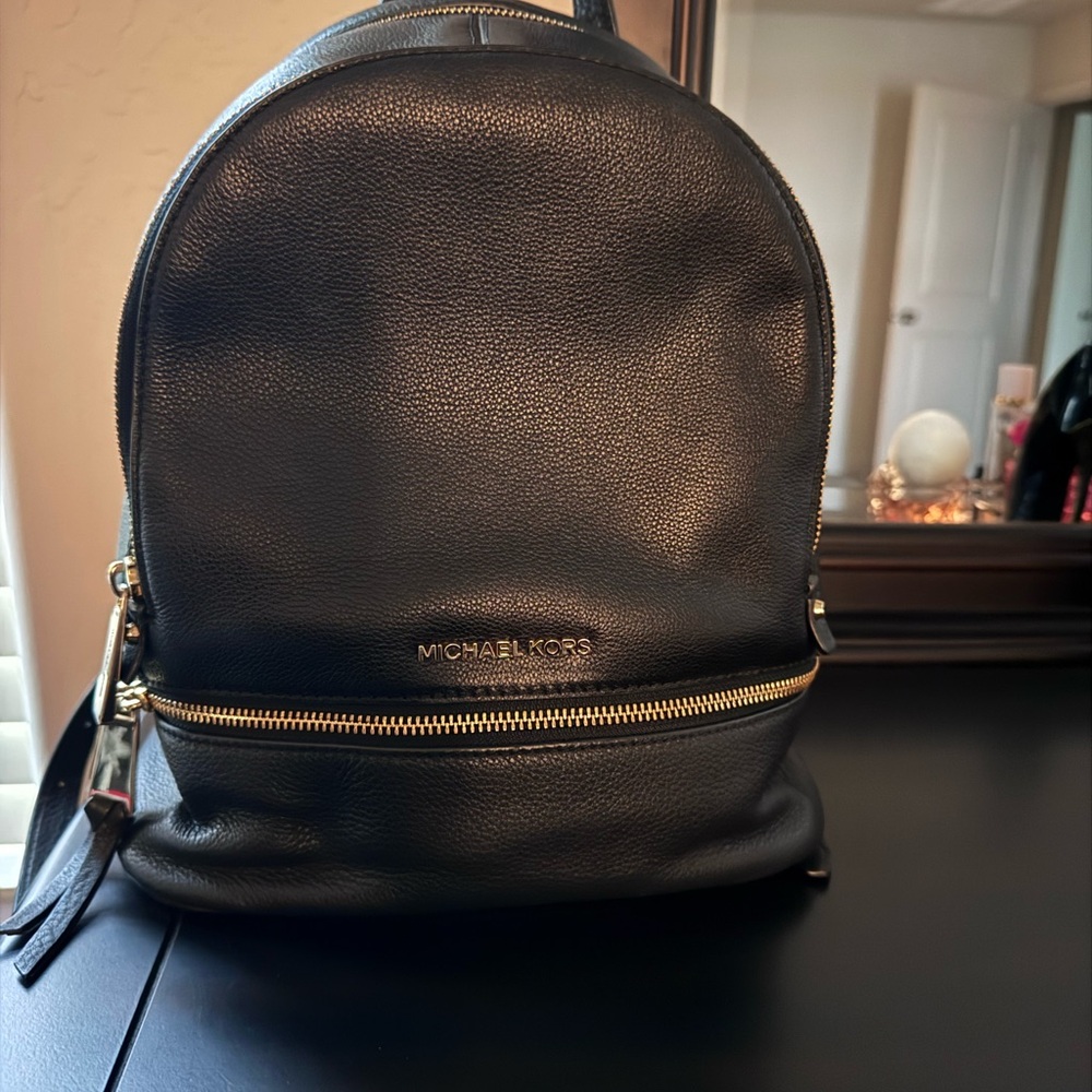 Michael Kors Black Leather Backpack with Gold Accents